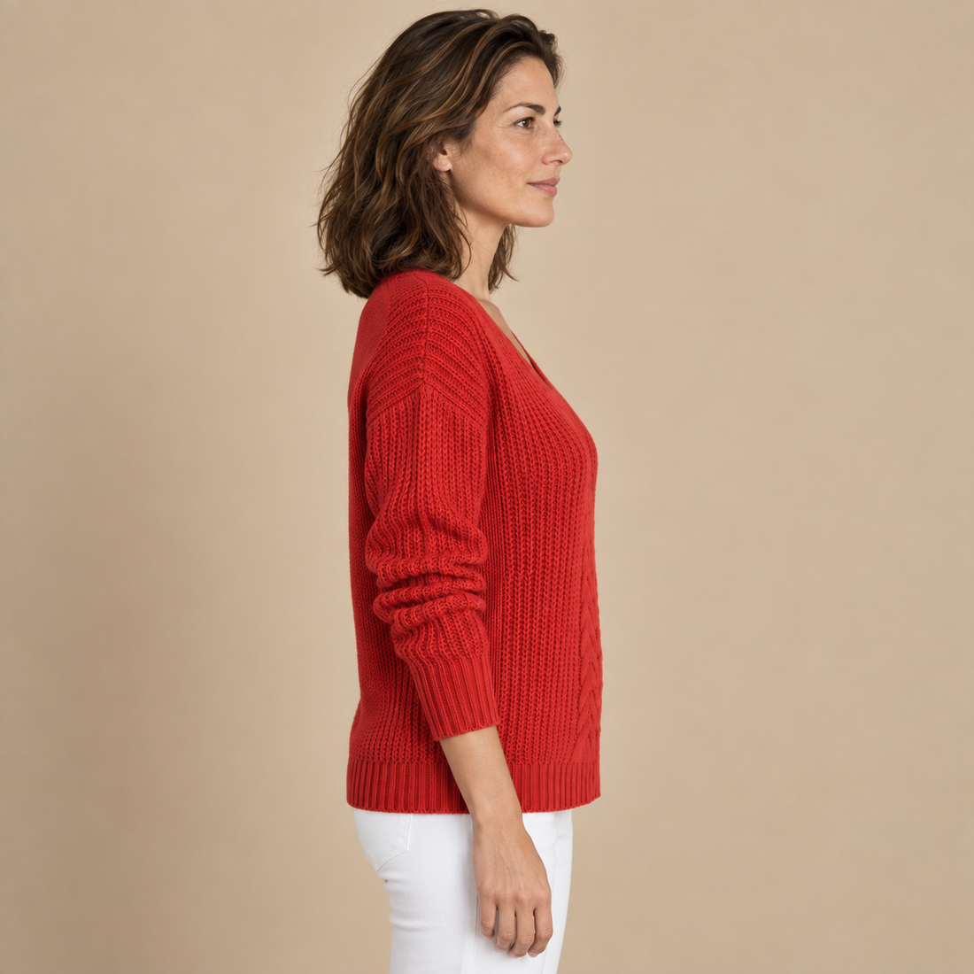 Sweter damski w warkocze w serek o luźnym kroju