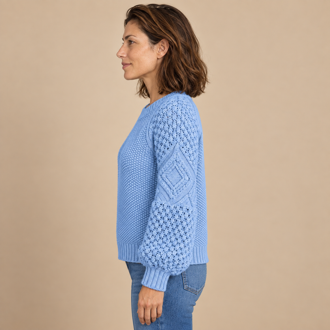 Sweter damski w warkocze z bufiastymi rękawami