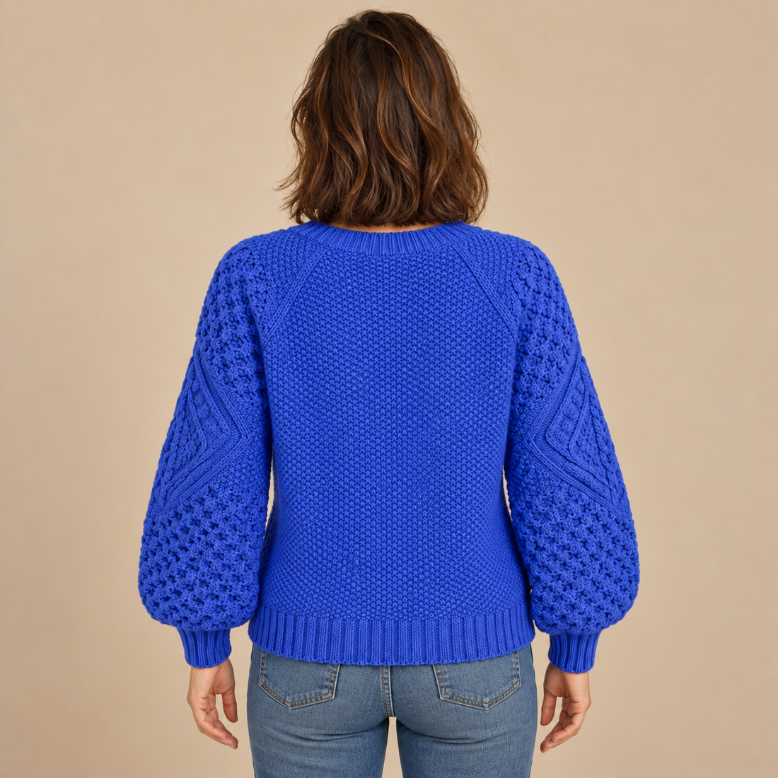 Sweter damski w warkocze z bufiastymi rękawami